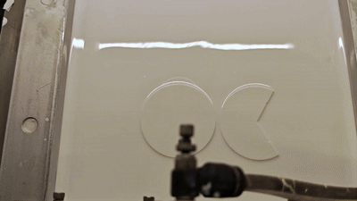 Figure 7 · Logo-retouched still frame of the printing process; replaces the source animation.